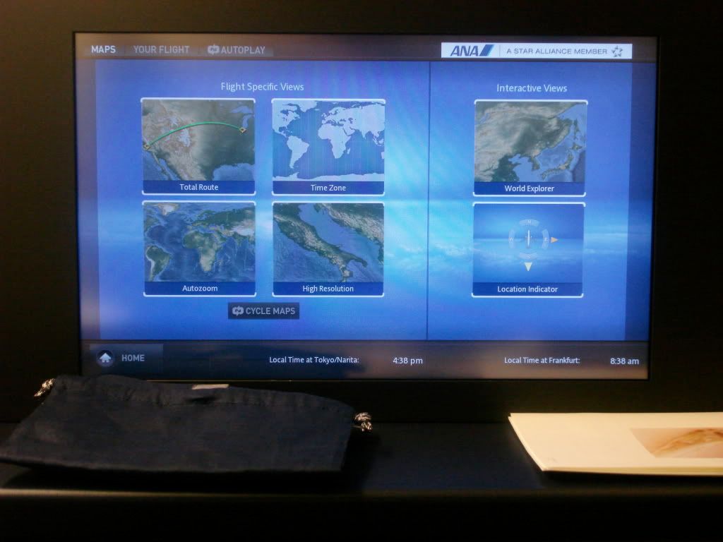 Flight map options, plus the amenity kit. After dinner I ordered dessert and ... DSC05656 Boarding was on time, the flight was naturally unremarkable except for the ...
