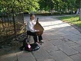 Bandura Performer, Andriivsky Uzviz near the Old Tilia - more than 350 years old